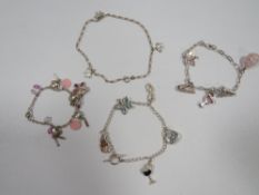 Two modern silver charm bracelets