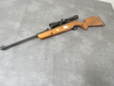 A Webley Xocet with spotting scope