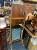 A vintage oak cheval mirror