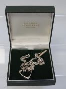A 958 standard silver chain with heart pendant engraved internal love approx weight 15.6g