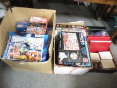 Two boxes of assorted Jigsaws puzzles together with a tray of postcards etc (3)