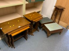 Two oak nests of tables with two adjustable stools and a small oak plant stand. (5)