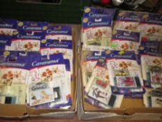 Two boxes of carded Pepsi cararma cars etc