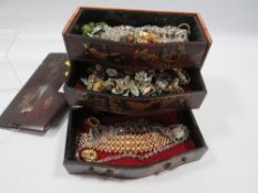 An antique Chinese jewel box and costume jewellery