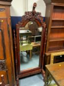 A Continental carved large cheval mirror H 216 cm W 88 cm