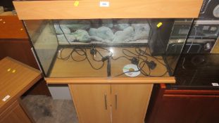 A fish tank, stand and accessories
