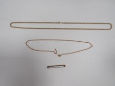 Two 9 carat gold necklaces together with a 9 carat gold bar brooch approx combined weight 16.1g