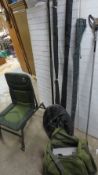 A selection of fishing equipment to include rods and fishing seat