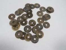 A collection of antique Chinese coins (38)