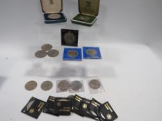 A box of crown coins, together with 2 royal medals