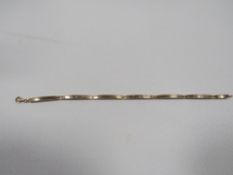 A hallmarked 9 carat gold diamond set bracelet 19cm approx weight 5.8g