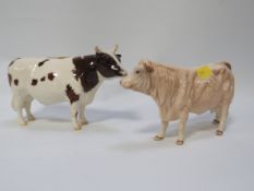 A Beswick Ayrshire Bull Whitehill mandate both horns broken together with a Beswick cow (2) - both