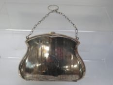 A hallmarked silver purse