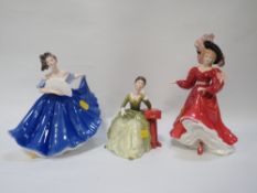 A Royal Doulton figurine Elaine together with a Carolyn and figure of the year Patricia