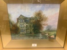 John Thornley - A signed watercolour of a Jacobean house with cattle watering, gilt framed and