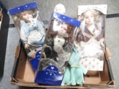 A tray of assorted boxed dolls