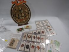 A Guinness 1997 free Gilroy Pin-badge cardboard POS display stand with 15 badges together with a