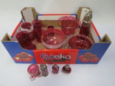 A collection of cranberry style glass to include hallmarked silver rimmed examples