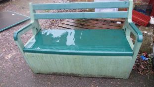 A Kettler plastic green garden storage bench
