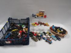A tray of assorted die cast toy cars etc
