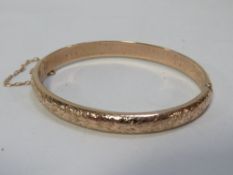 A gold bangle stamped 375 approx weight 8.2g