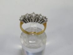 A hallmarked 18 carat gold five stone diamond ring with an estimated 1 carat of diamonds size I ½