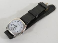 A mens military style watch by T Russell, the silver cushion case hallmarked Birmingham 1937