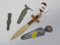 Four assorted bookmarks to include a hallmarked silver example with a pheasant