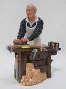 A Royal Doulton figure The Carpenter