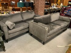 A pair of modern grey upholstered three seater settees. (2)