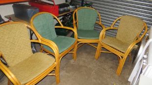 A set of 4 stacking bamboo light weight chairs