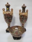 Five Oriental style bowls on stands