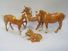 Three Beswick palomino horses and a foal (4)