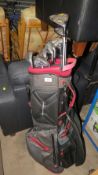 A set of Exotics golf clubs and bag