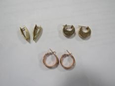 Three pairs of 9 carat gold earrings to include rose gold example approx weight 9.8g