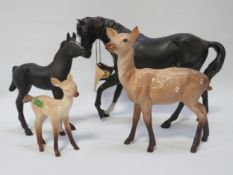 A Beswick Black Beauty foal, two deer and a Black Beauty horse A/F