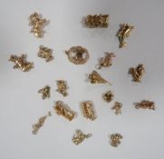 A bag of assorted gold charms approx combined weight 33.6g