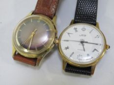 A mens 17 jewels watch and masonic dial wristwatch by UNO