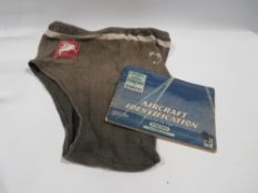 A WW2 British airborne pegasus formation sign patch, stitched to period woollen trunks, and a WW2