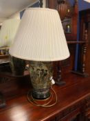 A modern Chinese style ceramic table lamp with shade