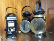 Three railway lamps consisting of A small porters handlamp, an LNER 4-Aspect Loco department