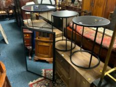 A show home mirror top table together with a pair of black lamp tables and a modern black mirror. (