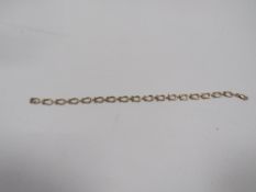 A hallmarked 9 carat gold horseshoe style bracelet 22cm approx weight 6.7g