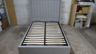 A double lift up storage bed frame