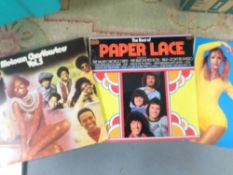 A tray of LP records and 7