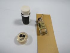 Natural gold samples, consisting of a flake and panned gold from Sovereign Hill Ballarat and crushed