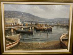 An oil on canvas depicting a harbour scene, signed lower right but indistinct, oak framed, 49 x 69