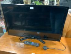 A Panasonic 32” flatscreen television and remote - House clearance