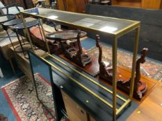 A modern gold metal hall console table W 152 cm