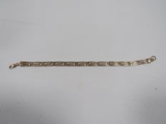 A hallmarked 9 carat gold Greek key bracelet approx weight 6.9g